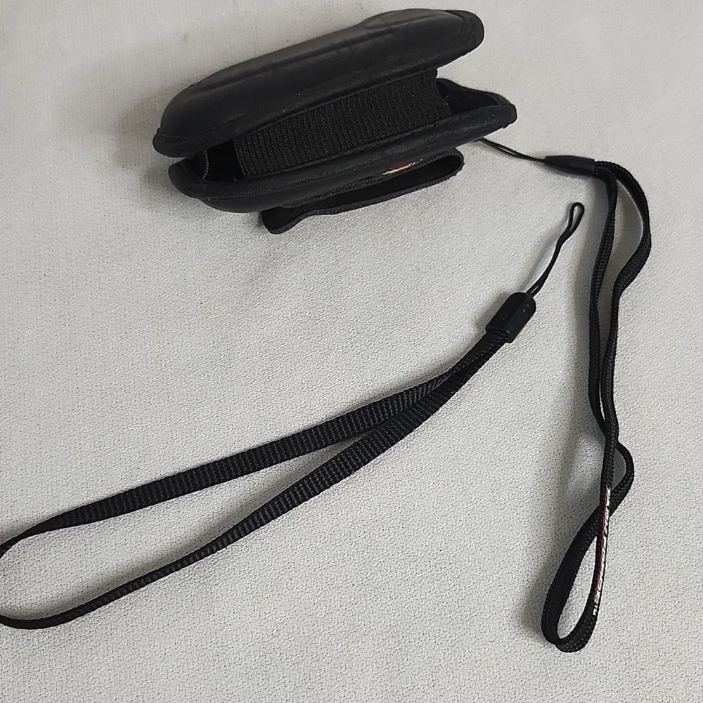 Assorted Vintage Electronic Charging Cables and Cases